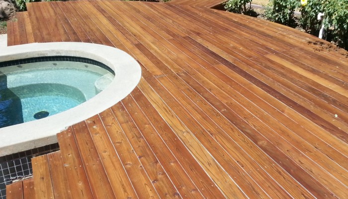 Redwood deck after power-washing and staining