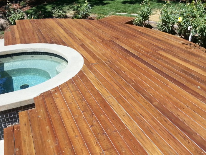 Redwood deck after power-washing and staining
