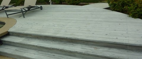 Redwood deck before power-washing and staining