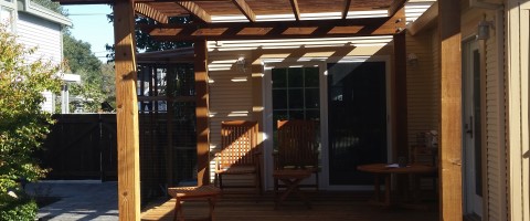 Redwood deck and trellis after restoration