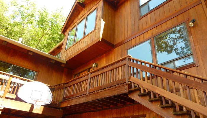 Redwood house with siding after maintenance