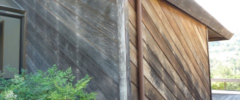 Redwood walls before cleaning and treating