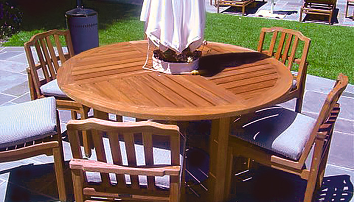 Teak table and chairs after cleaning and staining