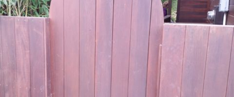 Redwood fence before cleaning