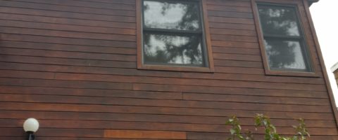 Redwood siding before cleaning